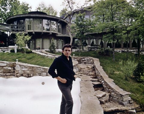 Johnny Cash in front of his home in Hendersonville, Tennessee