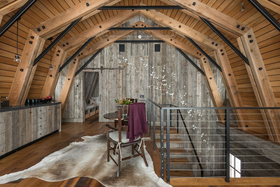 barn-inspired guest house kitchen and stairs