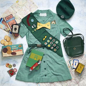 vintage girl scout uniform, cookie box, badges, and memorabilia