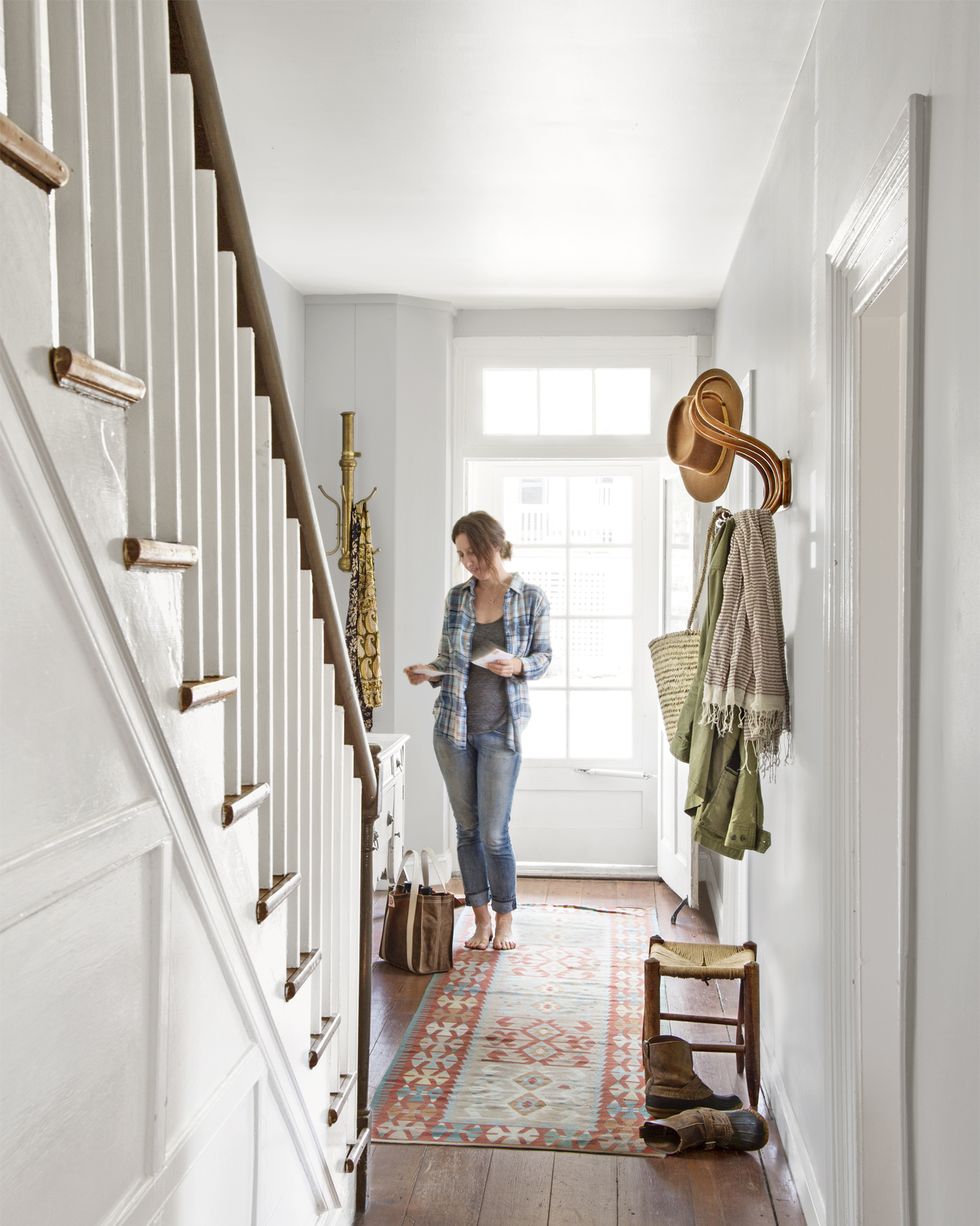 hat, floor, jeans, flooring, interior design, stairs, sun hat, denim, wood flooring, handrail,