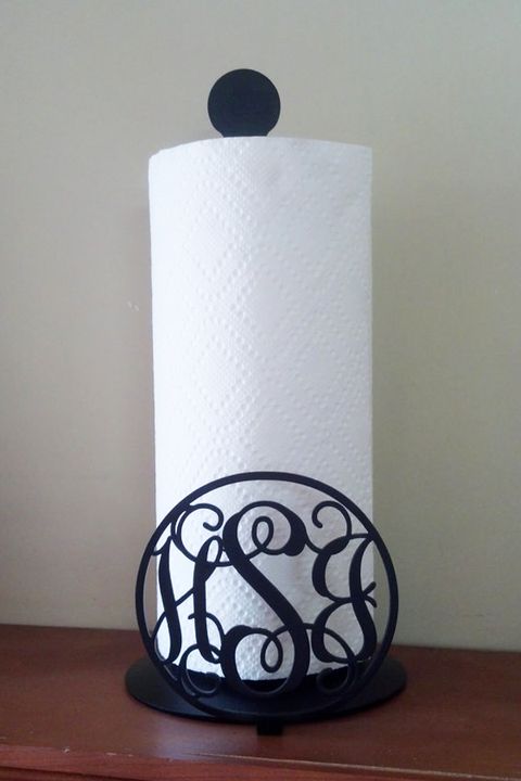 Paper towel holder, Paper towel, Textile, Material property, Paper, Cylinder, Toilet paper, Toilet roll holder, Vase, Circle, 