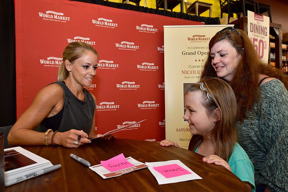 Nicole Curtis signs copies of her new book