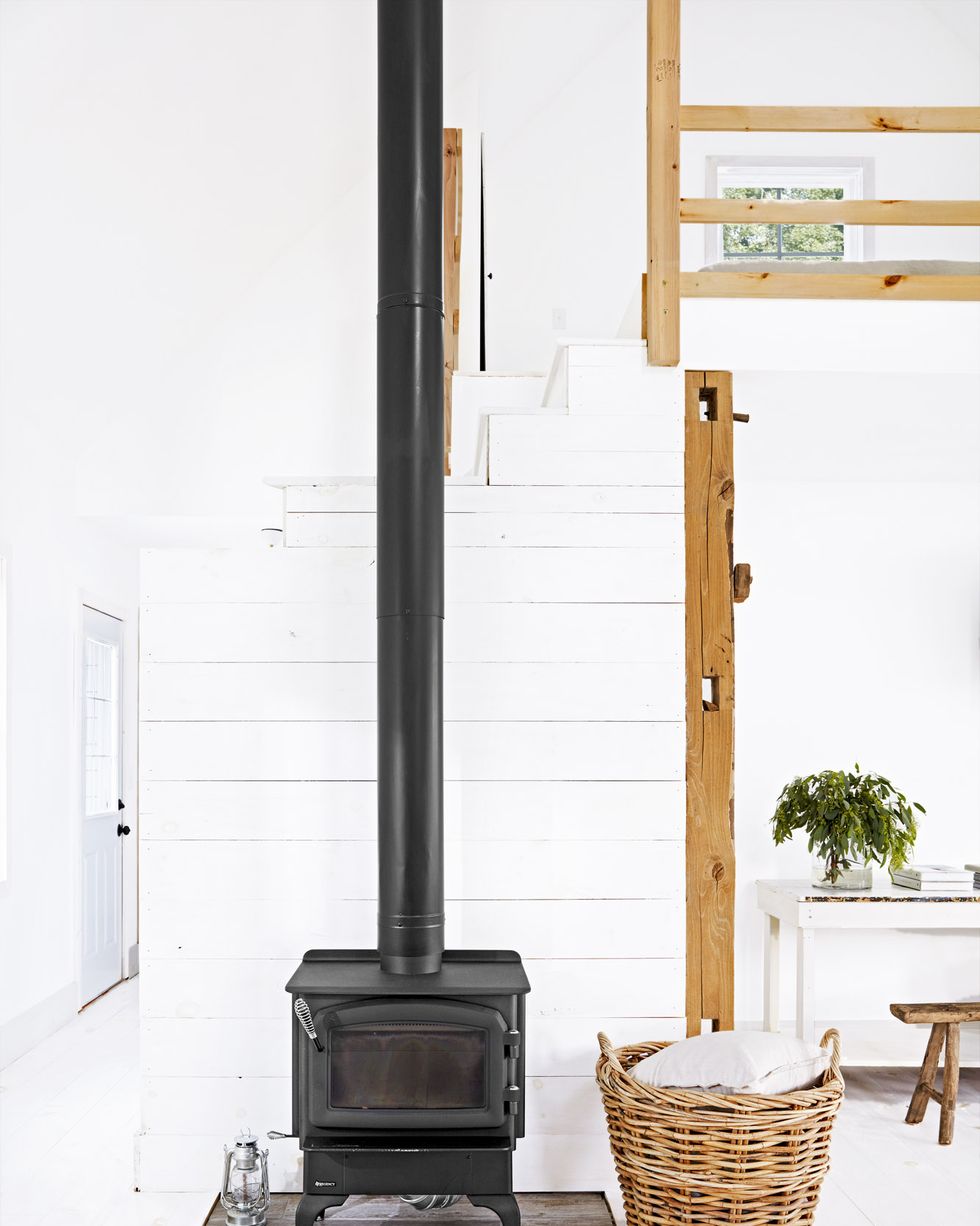 black cast iron stove in a white room