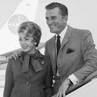 Kirk and Anne Douglas disembark Pan Am jet