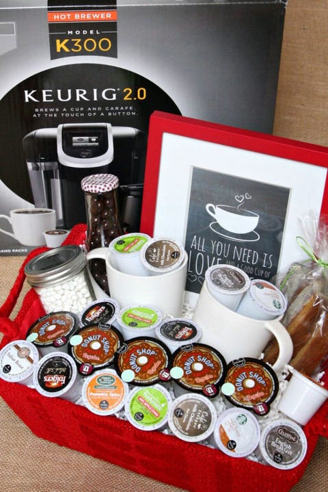 Coffee Lover's Father's Day Gift Basket red woven basket filled a variety of coffee pos, mugs, chocolate covered beans, biscotti and a framed sign reading all you need is a good cup of coffee