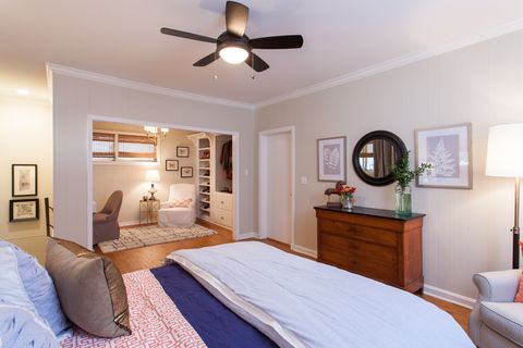 Bedroom, Ceiling fan, Room, Furniture, Bed, Property, Bed sheet, Bed frame, Interior design, Building, 