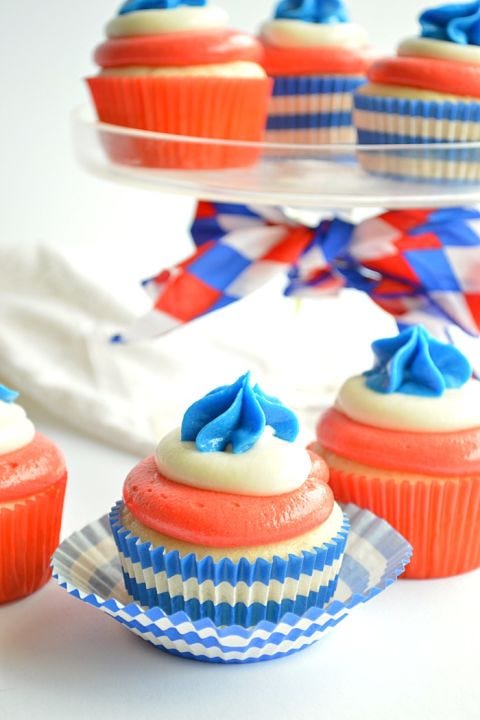 Baking cup, Food, Cupcake, Orange, Dessert, Buttercream, Cake decorating supply, Cake, Baked goods, Cuisine,
