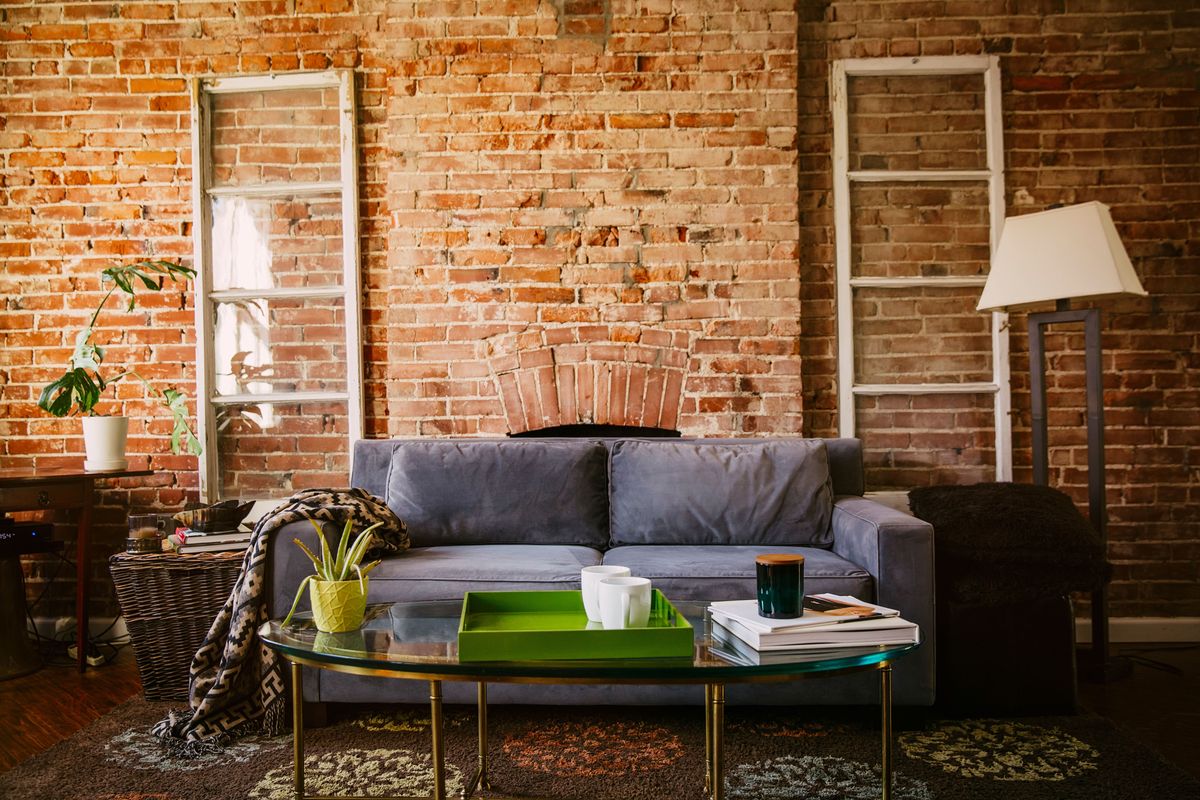 Brown, Room, Brick, Interior design, Wall, Table, Furniture, Living room, Couch, Home, 