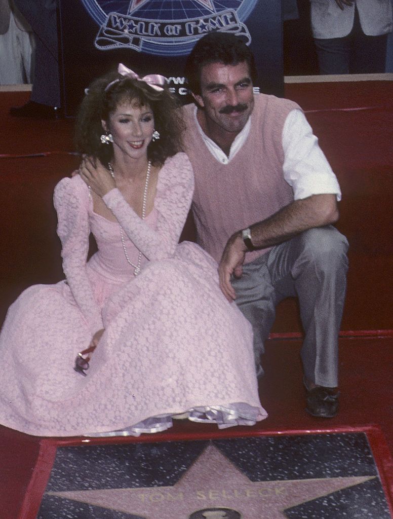 Mack and Tom Selleck dressed in matching pink for his Hollywood Boulevard star unveiling.