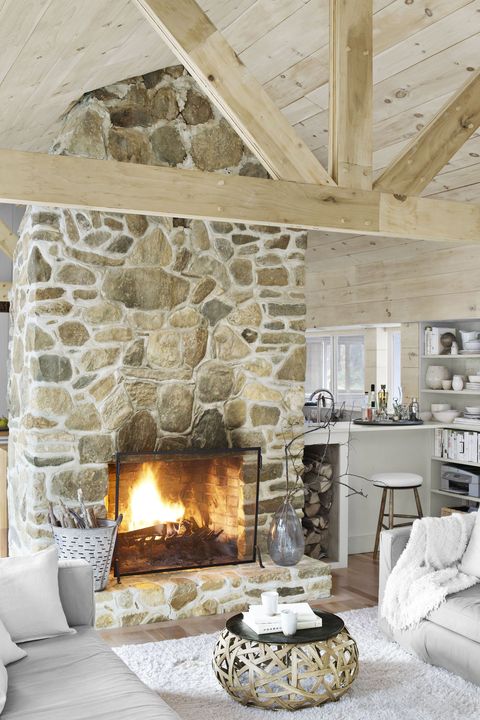 Living room, Hearth, Room, Fireplace, Interior design, Property, Furniture, Wall, Home, Stone wall, 