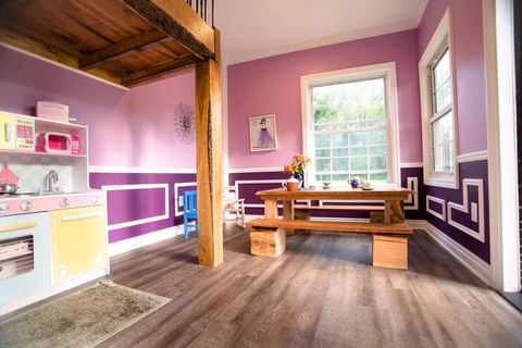 Room, Interior design, Wood flooring, Furniture, Property, Laminate flooring, Floor, Building, Hardwood, Purple, 
