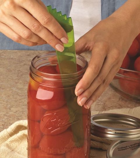 Mason jar, Vegetable juice, Canning, Food, Drink, Juice, Preserved food, Ingredient, Hand, Tomato juice, 