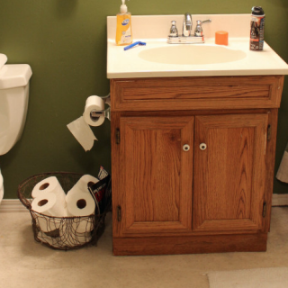 Bathroom, Bathroom cabinet, Sink, Room, Toilet, Bathroom accessory, Bathroom sink, Floor, Plumbing fixture, Furniture, 