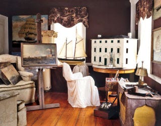 parlor with easel and dollhouse