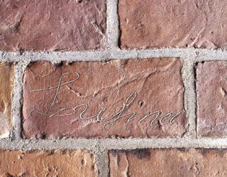 Original brick with signature