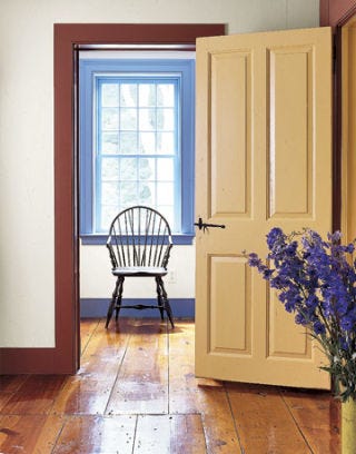 Cane back chair and window