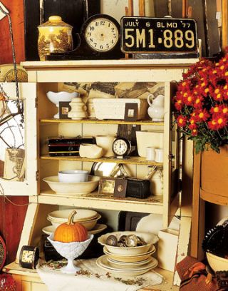 shelf with antiques and knick knacks
