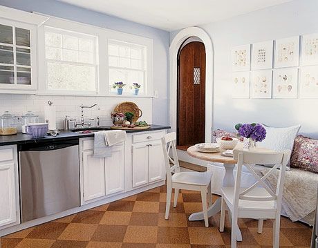 kitchen with checkered flooring and rounded doorway