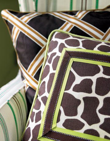 giraffe and criss cross patterned pillows