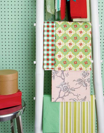 white bamboo ladder for storing wrapping paper