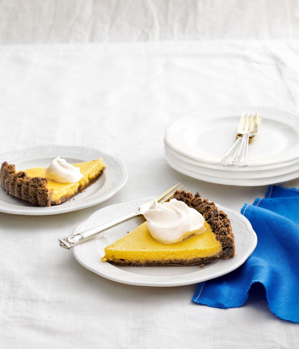 meyer lemon tart with gingersnap crust and almond whipped cream