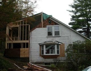 peak of house gets framing