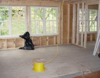 bare room with windows and frames installed