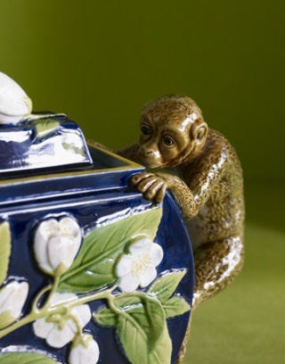 navy floral teapot with monkey handle