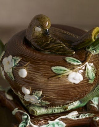 victorian floral tea pot with bird nesting on lid
