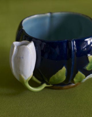navy tea cup with tulip handle