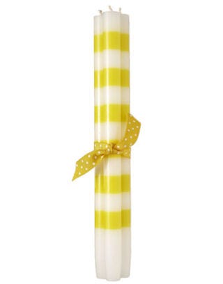 yellow and white stripe candles