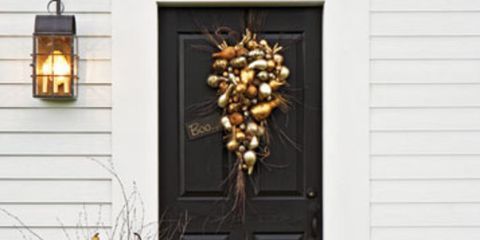 gilded pumpkins on doorstep
