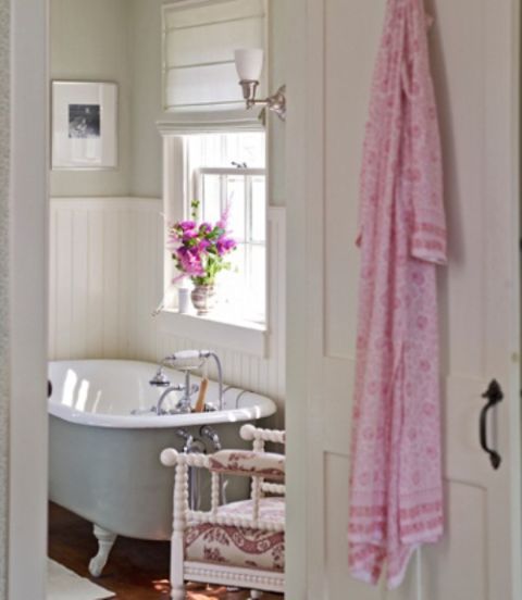 white bathroom with pink accents