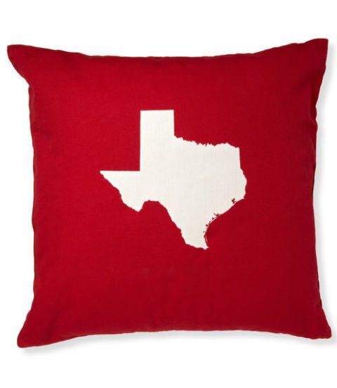 red pillow with teaxas state motif