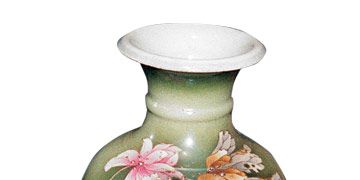 muted green vase with painted flowers