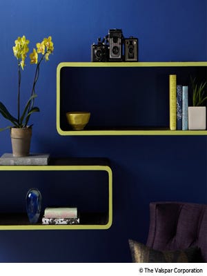 bright green shelves against a deep blue wall
