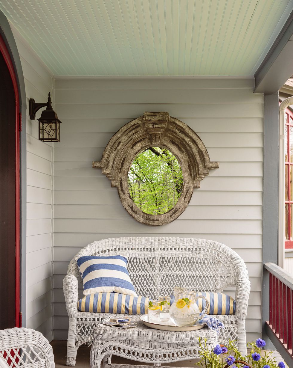 porch with white wicker furniture
