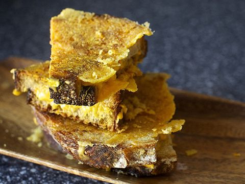 stacked slices grilled bread with melted cheese on the outside, a unique spin on traditional grilled cheese recipes