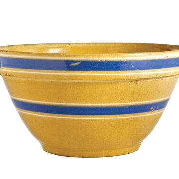 yellow bowl with two thick blue stripes