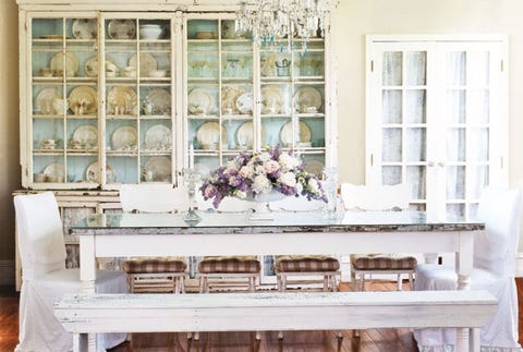 white table and cabinets in dining room