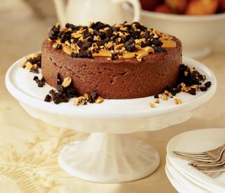 chocolate cheesecake with peanut and chocolate cookie topping