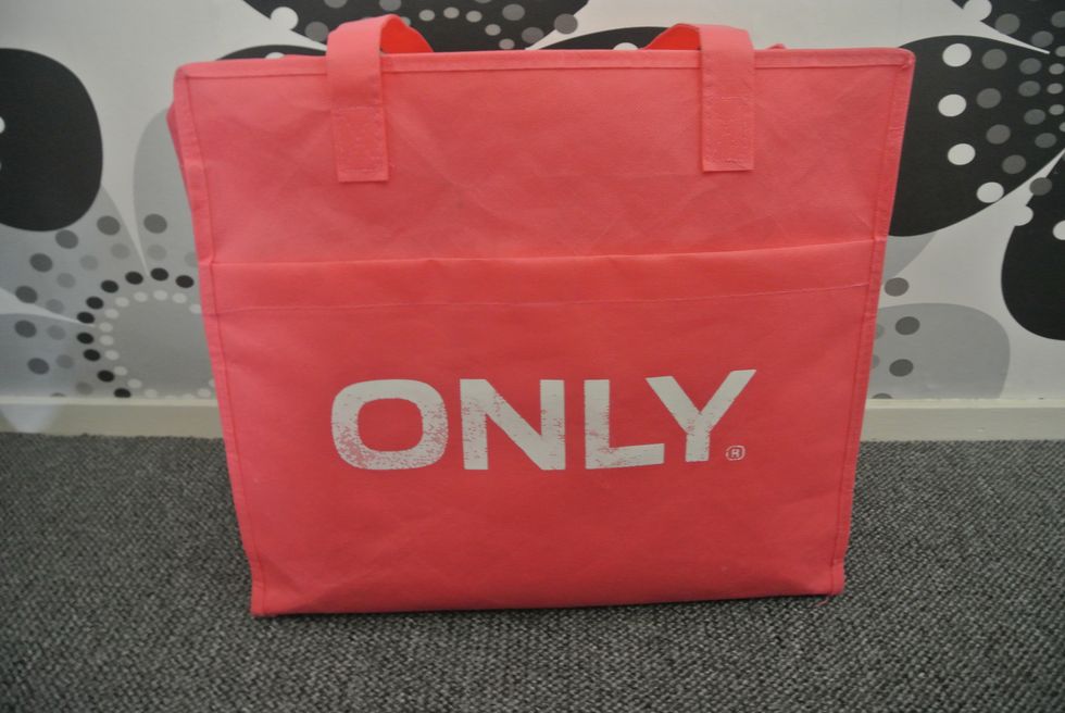 Red, Bag, Shopping bag, Pink, Paper bag, Handbag, Material property, Packaging and labeling, Fashion accessory, Luggage and bags, 