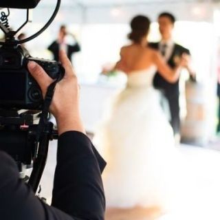 Dress, Video camera, Photograph, Camera, Bridal clothing, Cameras & optics, Camera operator, Videographer, Formal wear, Strapless dress, 