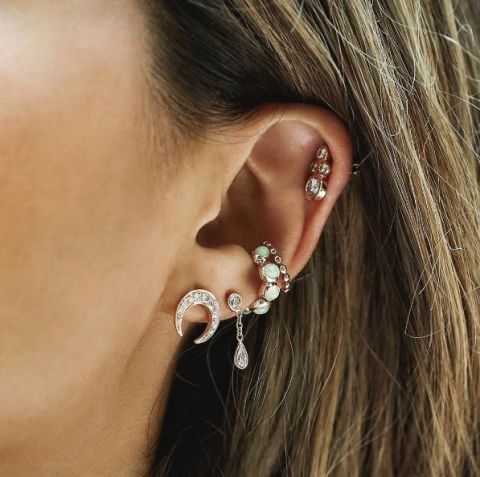 Ear, Body jewelry, Earrings, Organ, Close-up, Jewellery, Body piercing, Chin, Fashion accessory, Cheek, 