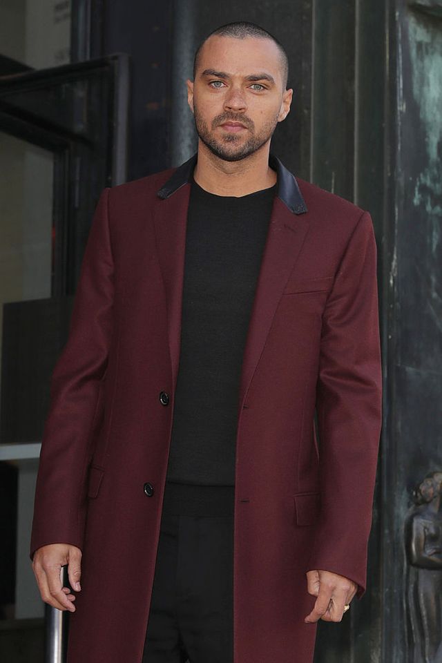 Clothing, Coat, Collar, Sleeve, Facial hair, Human body, Textile, Outerwear, Standing, Formal wear, 