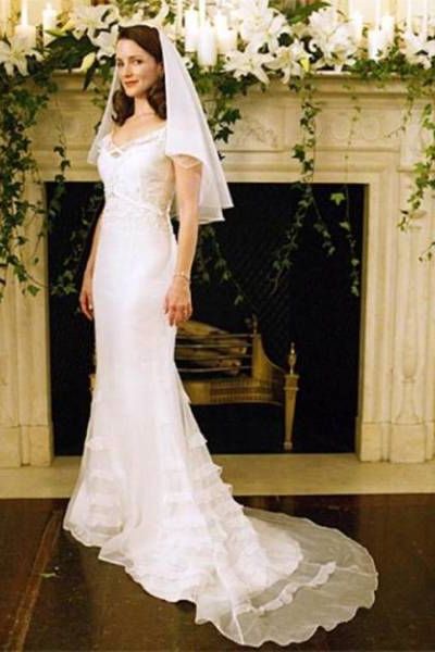 Gown, Wedding dress, Bride, Dress, Clothing, Bridal clothing, Photograph, Shoulder, Bridal accessory, Bridal party dress, 