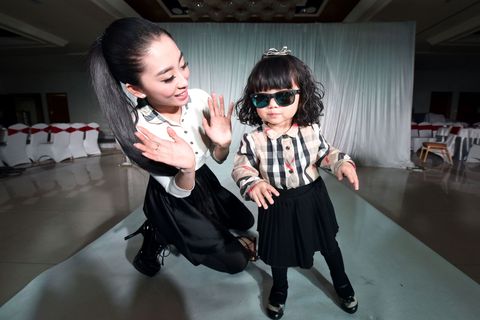 Trousers, Floor, Baby & toddler clothing, Fashion, Black hair, Flash photography, Goggles, Sunglasses, Sock, Baby, 