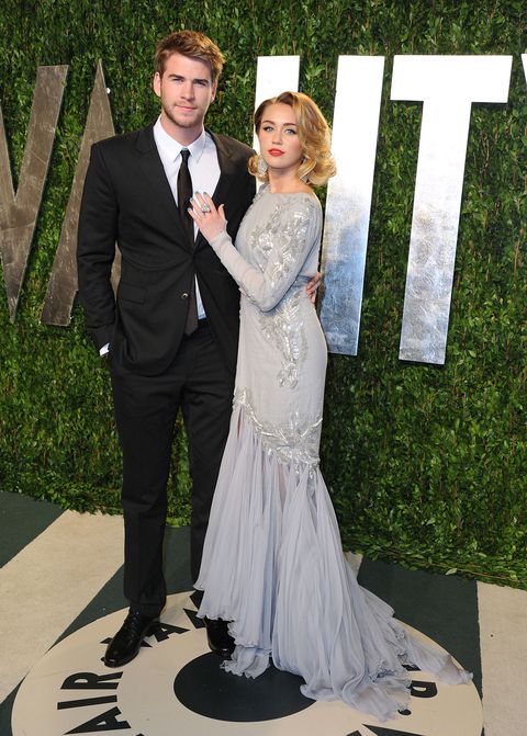 Miley Cyrus and Liam Hemsworth at Vanity Fair Oscars Party