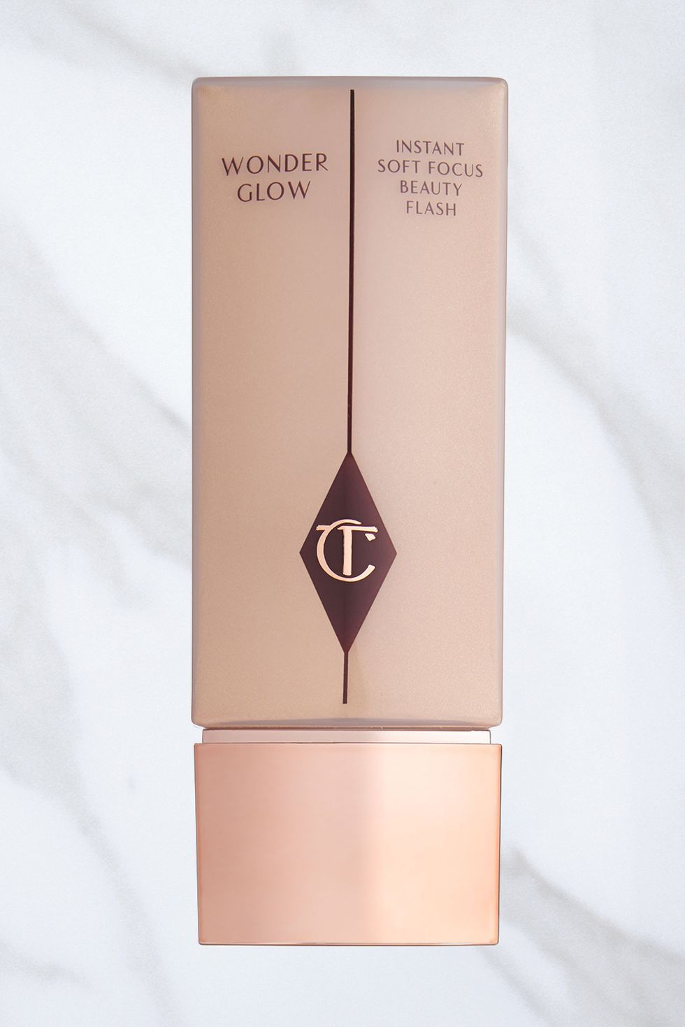 <p>To amp up the glow factor, dab a shimmery primer like <a href="http://www.charlottetilbury.com/us/wonderglow.html" target="_blank">Charlotte Tilbury Wonderglow</a>, $55, above your cheekbones, brow bones, and along your T-zone. "It creates a subtle effect that doesn't read too 'disco ball,'" says Bass.</p>
