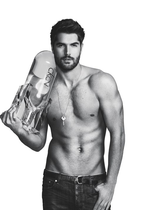 Here Are 6 Hot Shirtless Guys Holding Giant Bottles of Perfume